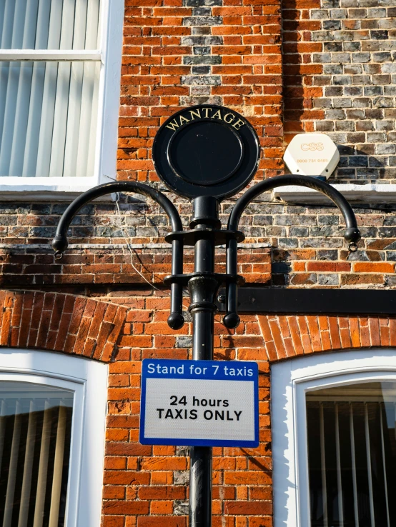 a street sign is attached to a pole