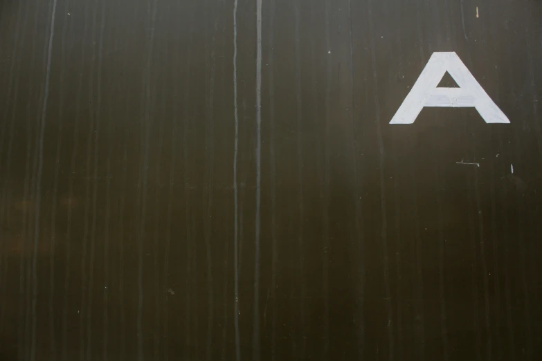 a logo on the side of a truck that is parked