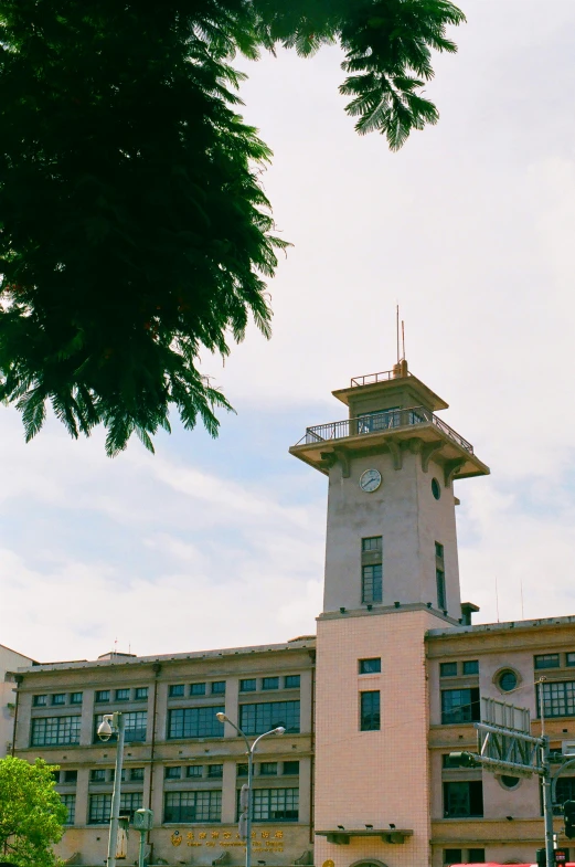 a very tall clock tower sitting over a building