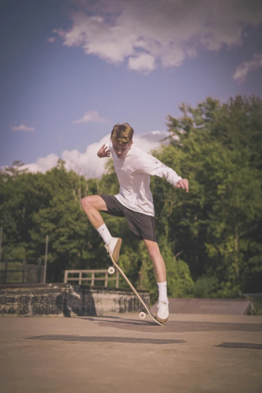 a man on a skateboard jumping high in the air