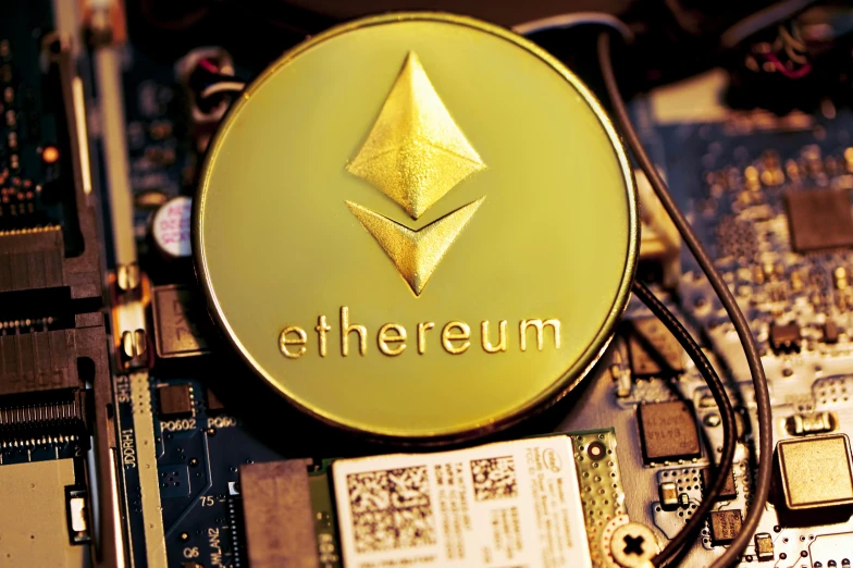 the logo of a ether company is shown above its motherboard