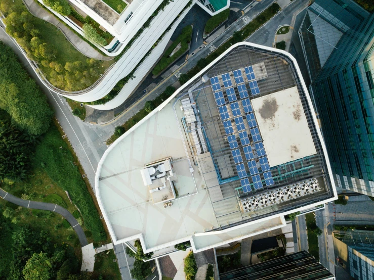 an aerial po of a building with blue balconies