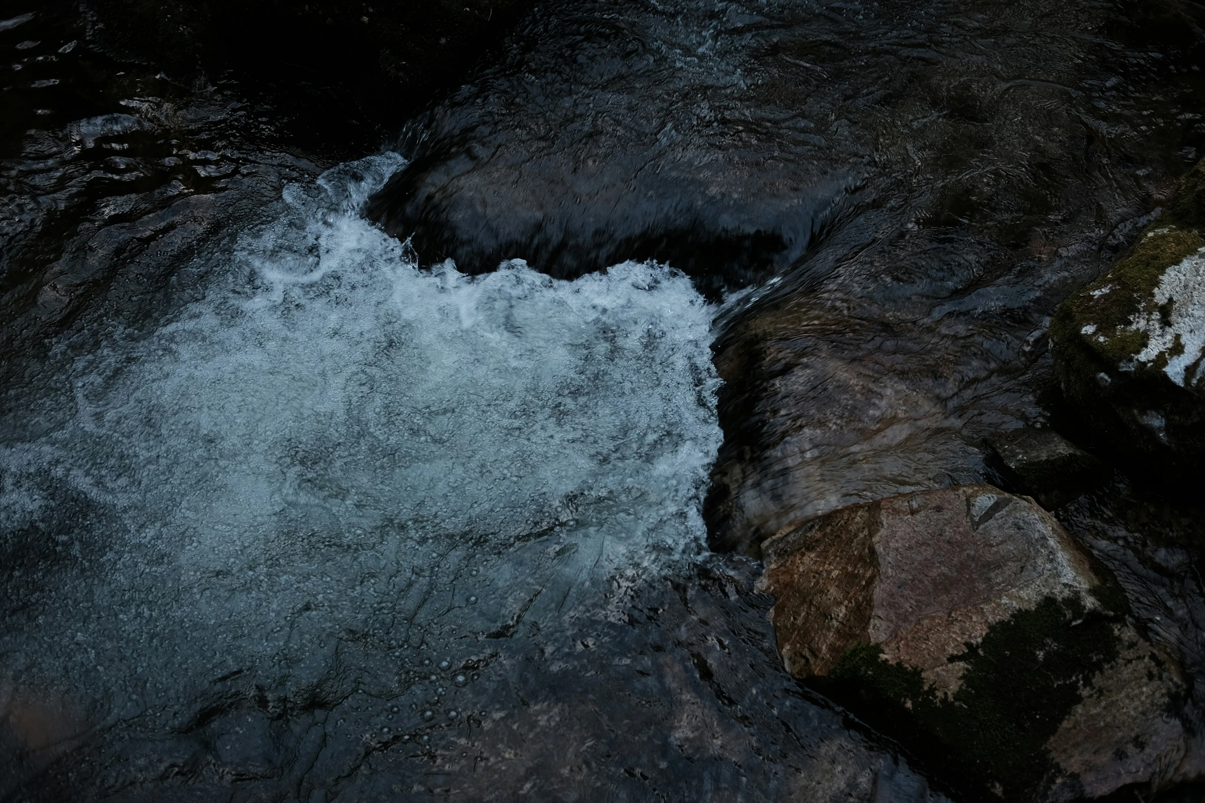 a very close up s of the water on a river