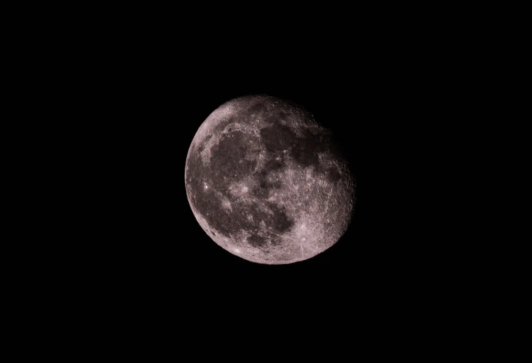 the moon, seen from a distance at night