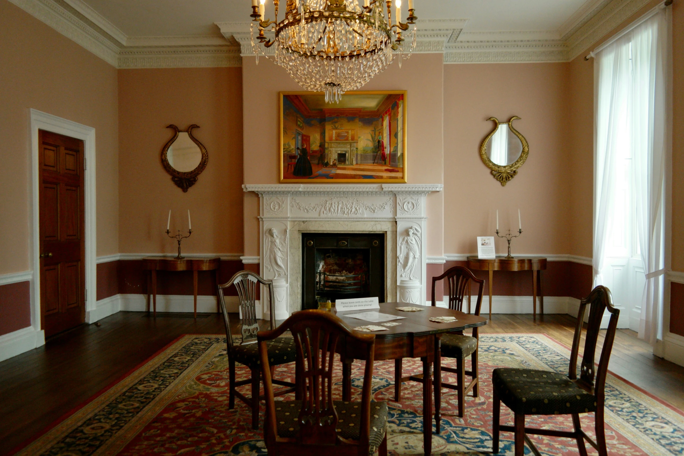 a room with fancy decor and wood furnishings