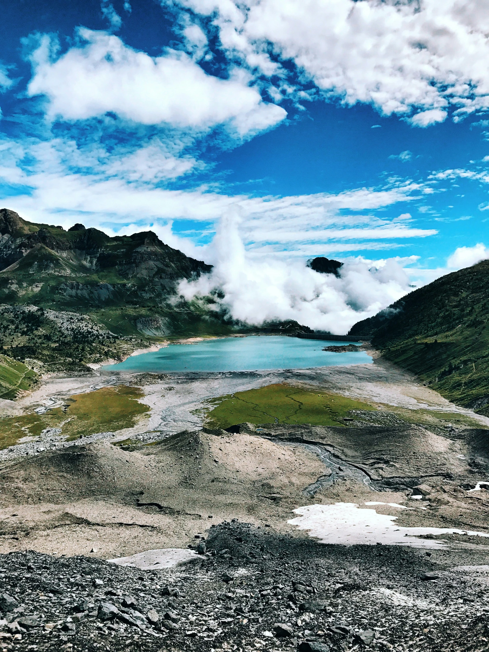 an aerial view of a mountain lake