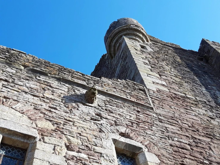 stone castle structure looking up from below
