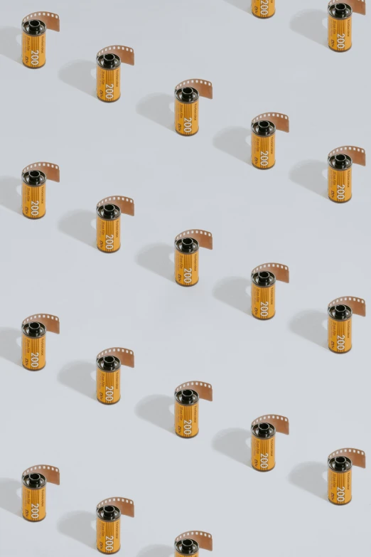 rows of different sized small camera clips on a white background