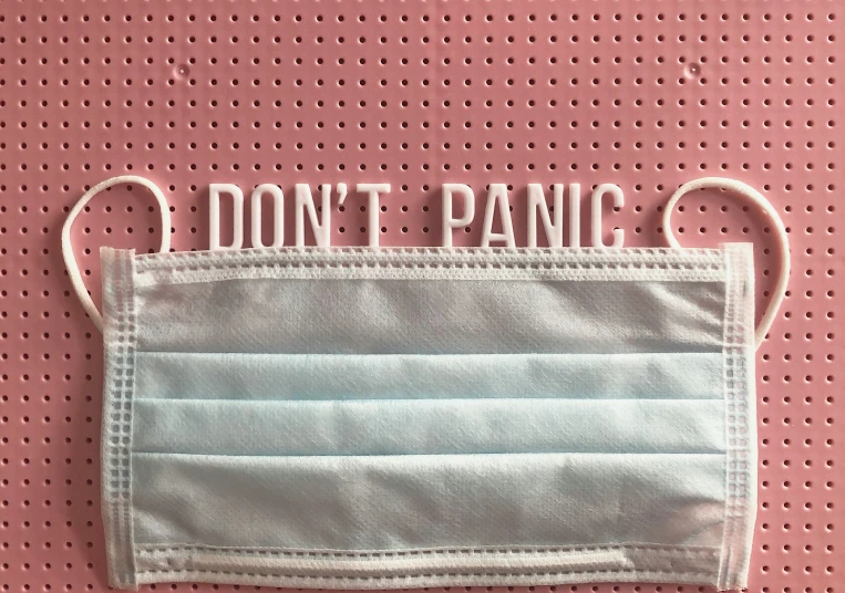 this mask has writing on it that reads, don't panic