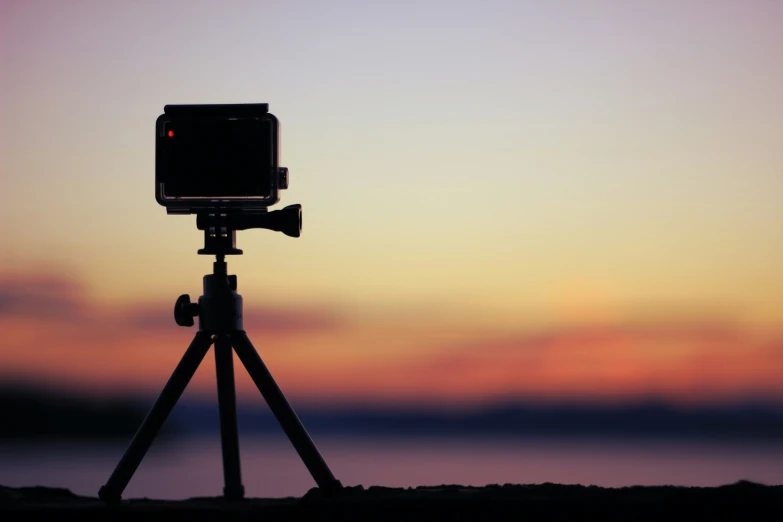 an image of a camera sitting on a tripod