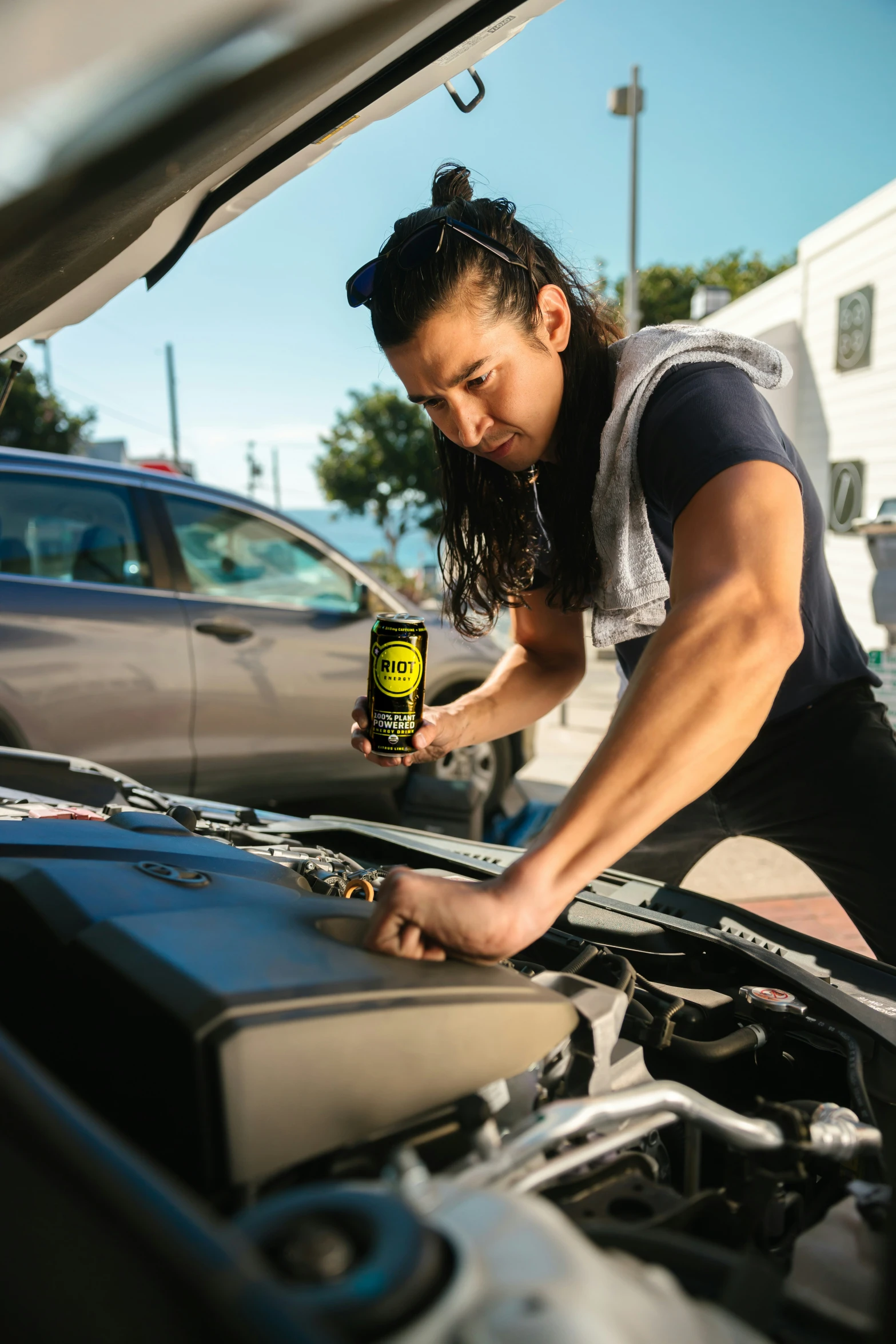 a man is drinking his engine oil