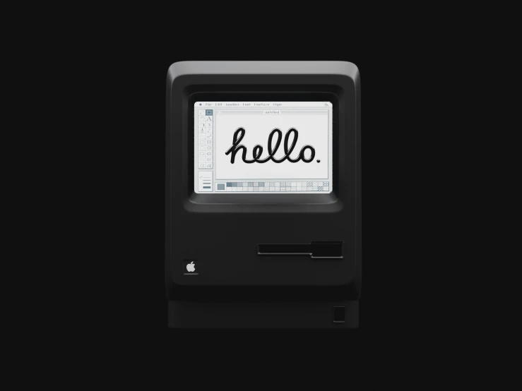 an old computer that says hello is written on it