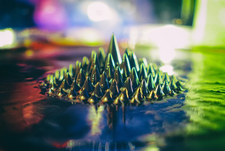 a large metal spikes on a table at night