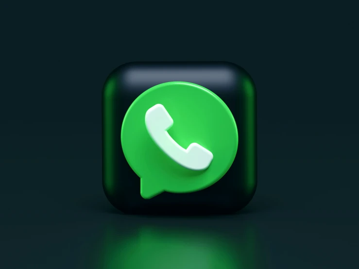 a green icon that is on a dark background