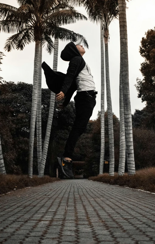 a person jumping up on a skate board