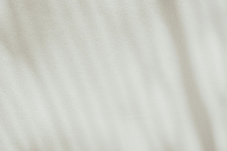 small brown birds sitting in a row on top of a white table