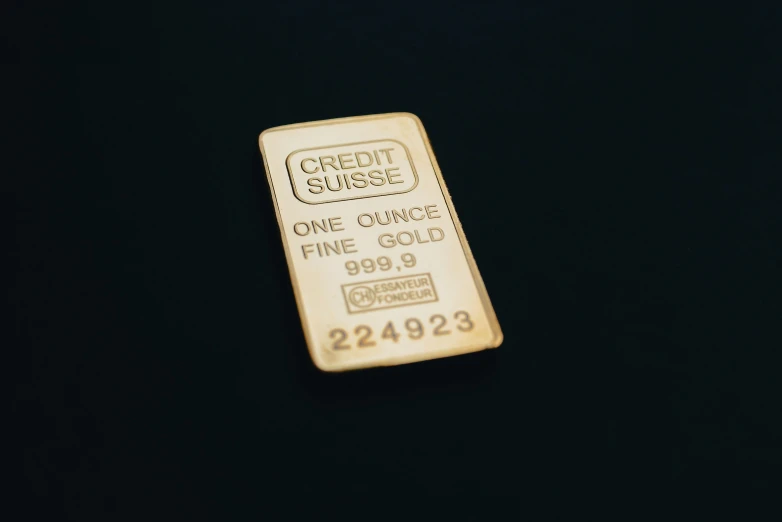 a gold bar with numbers on it