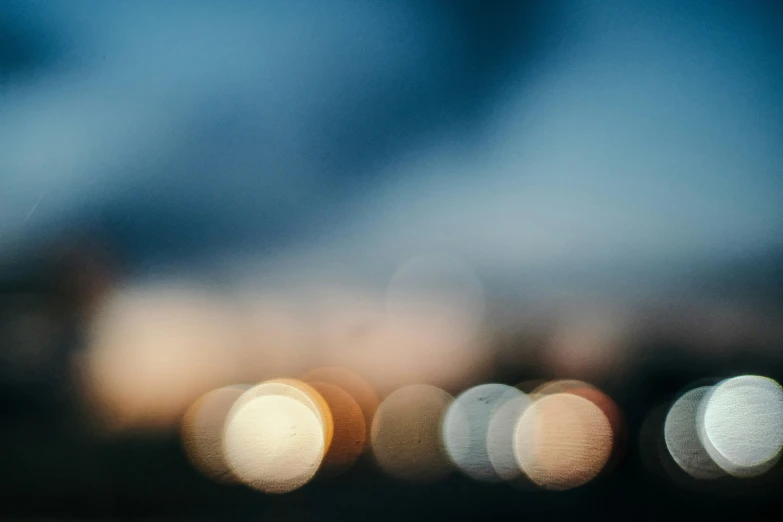 blurry lights on the side of a building at night