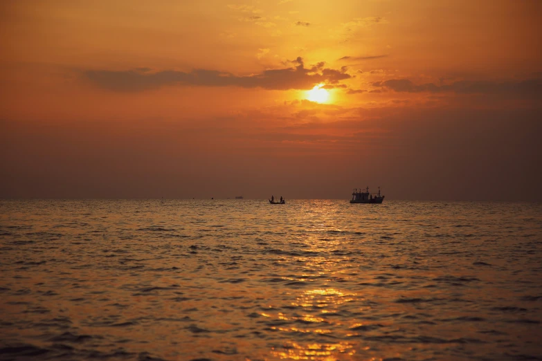 some boats in the middle of a body of water