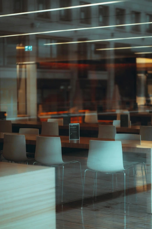 a po of a row of chairs that are next to a table