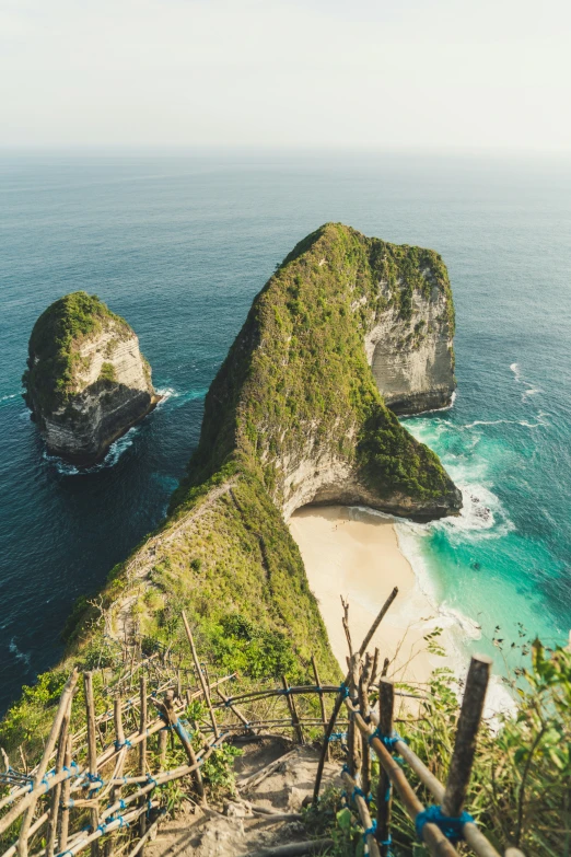 the steps lead down to an secluded beach