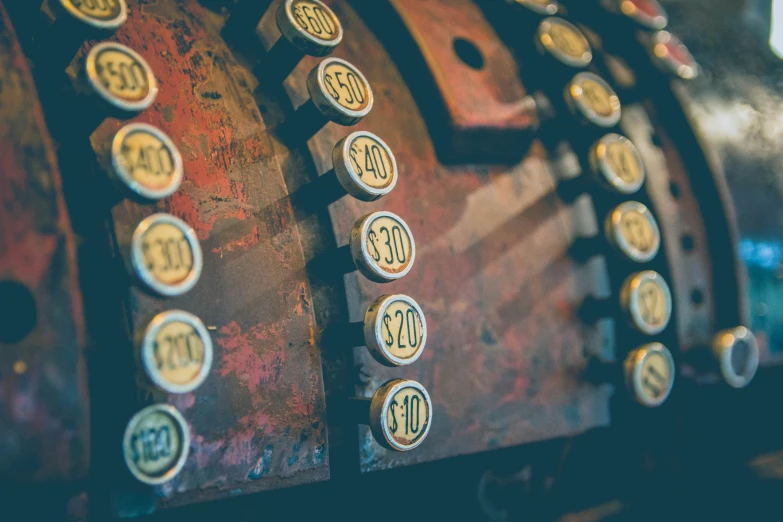 many antique wooden typewriter keys are scattered about