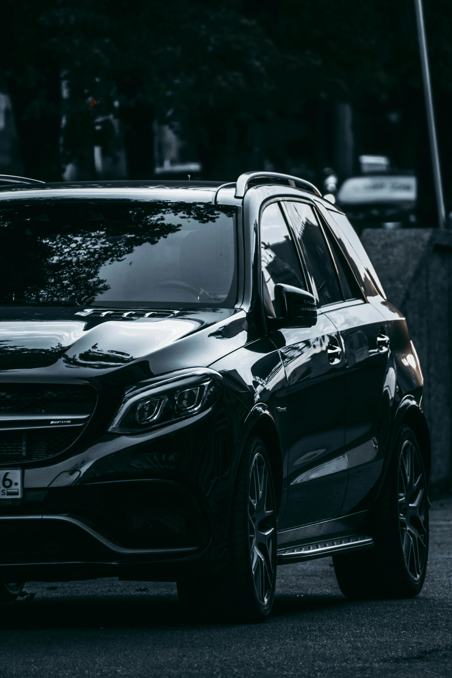 a very nice looking black mercedes suv