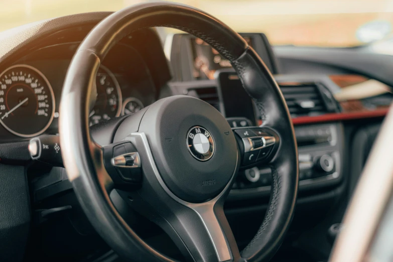 a steering wheel and dashboard in a car