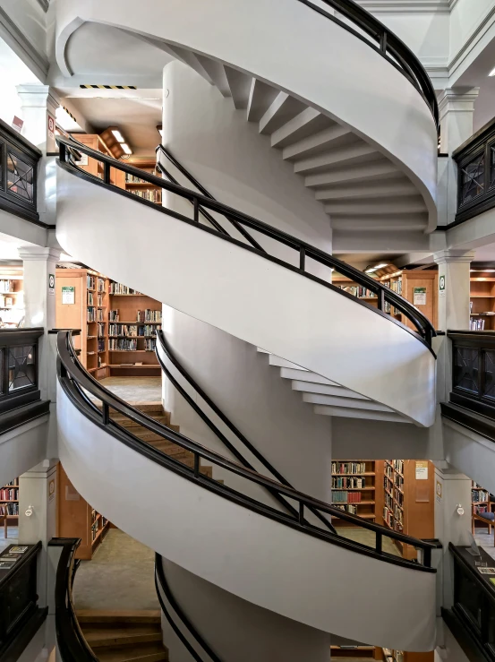 a staircase going to the top of a large liry