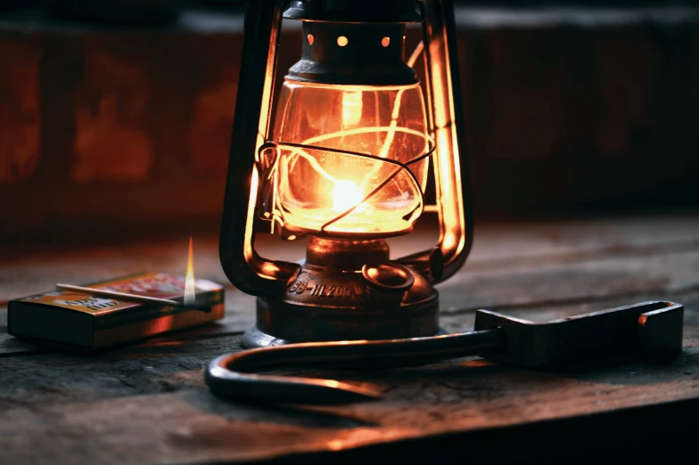 a large lantern with some kind of wire inside of it