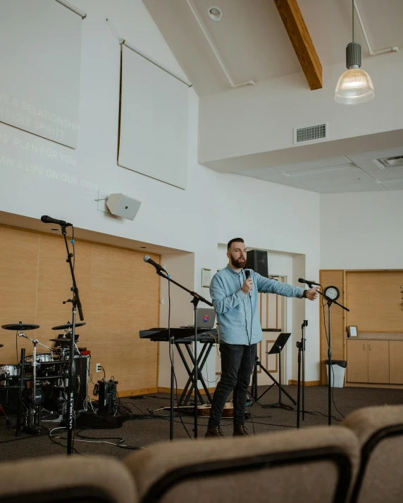 a man is giving a lecture at the event