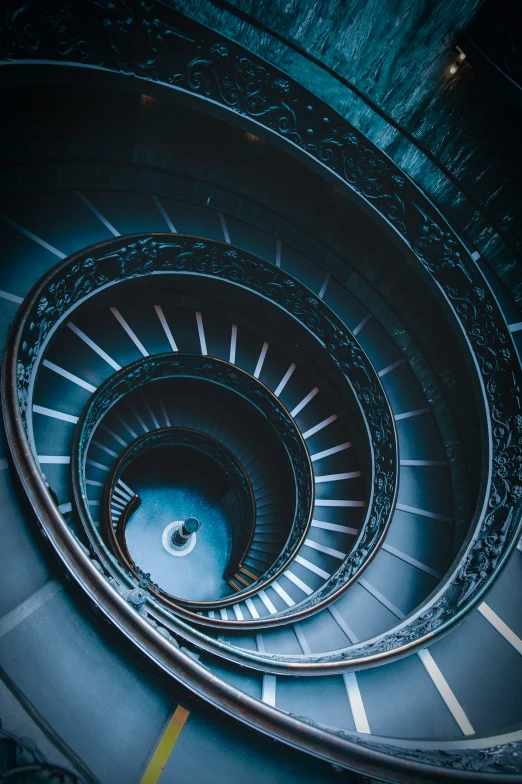 a spiral staircase with its light on it