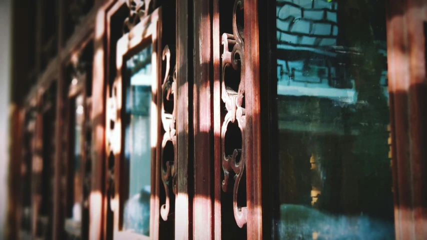a closeup of the wooden door handles
