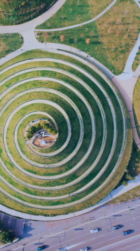 an aerial view of a circular garden design