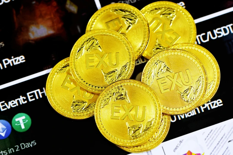 golden coin sitting on top of a table