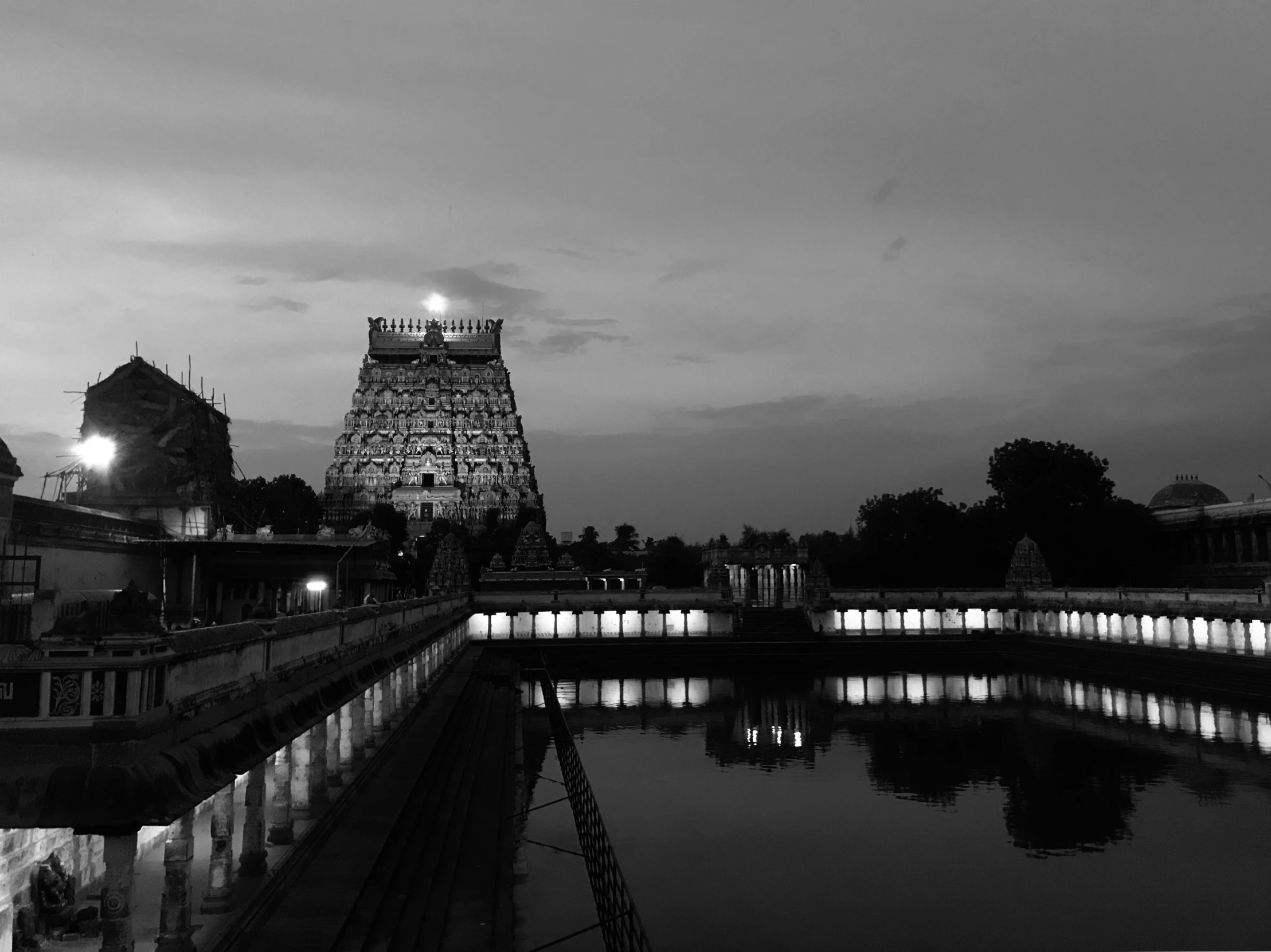 black and white pograph of the tower in india at night