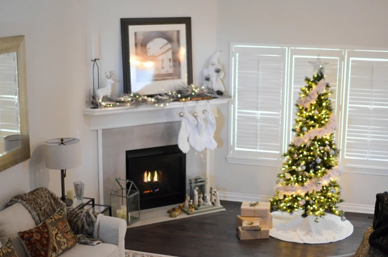 a christmas tree in the corner of a living room