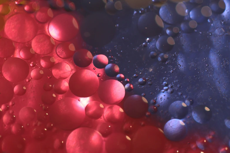 the image is blurry and shows blue bubbles in red