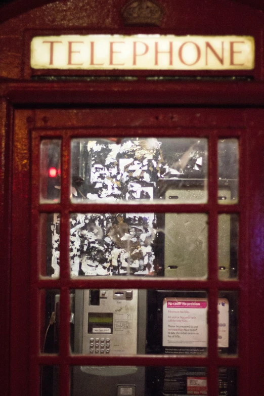 an old phone booth in the city of london