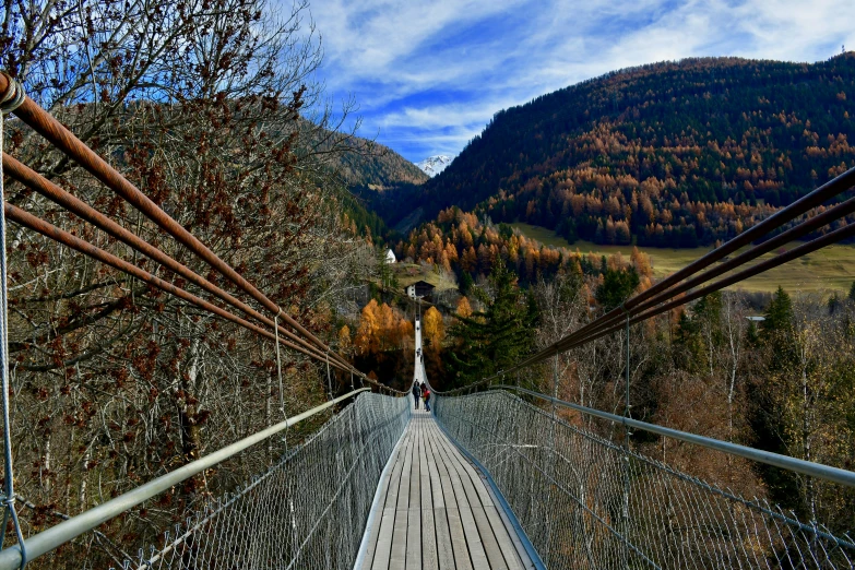 an empty bridge on a small mountain side