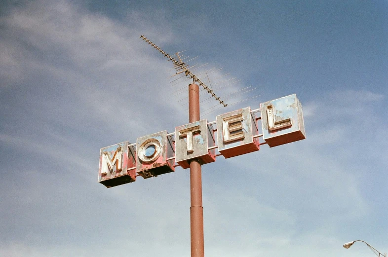 the motel sign on the old street is now empty