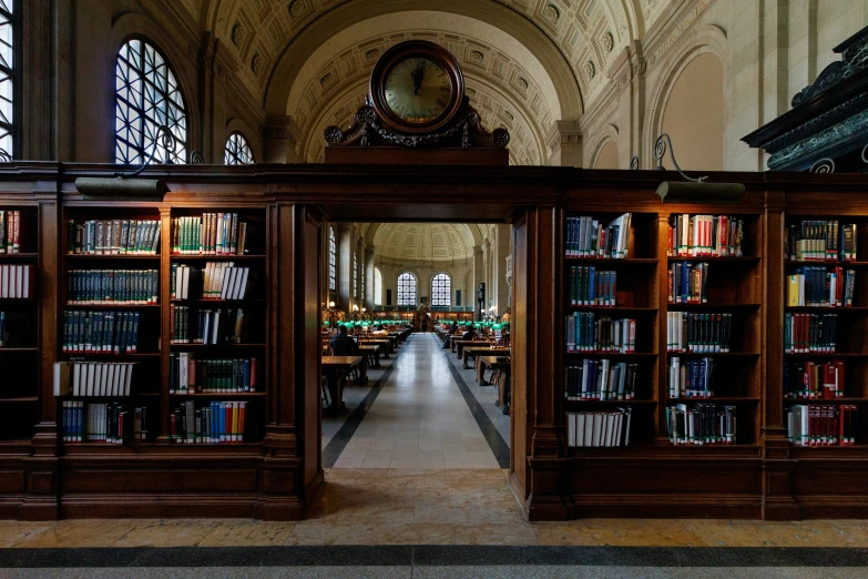 a bookshelf with lots of books in a liry