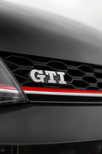 the front end of a car with a gt logo