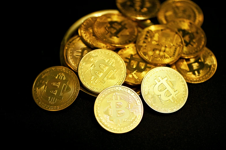 several gold bitcoins are shown here