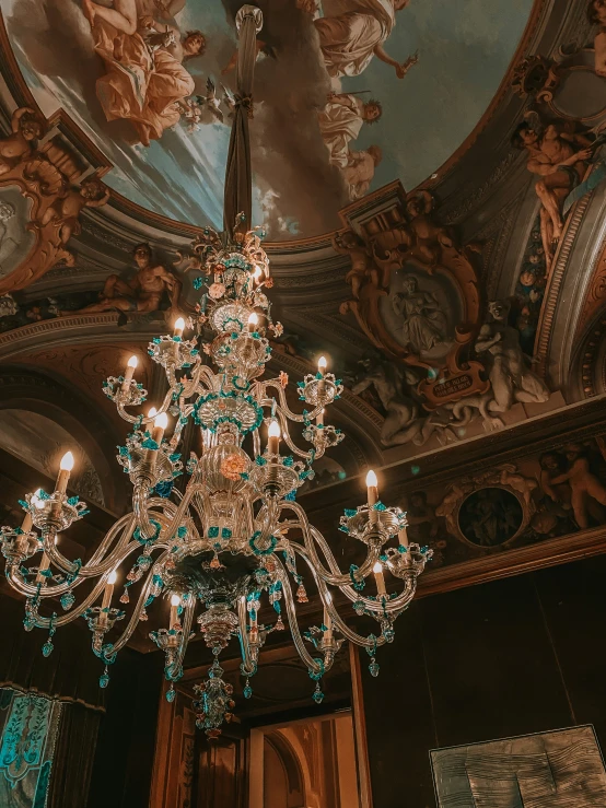 a large, elaborate chandelier with many small, colorful lights hanging from it