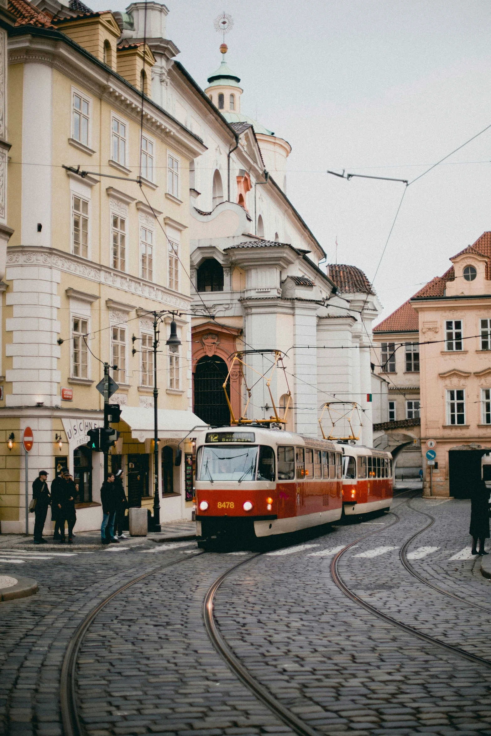 a trolley passing by in the old part of town