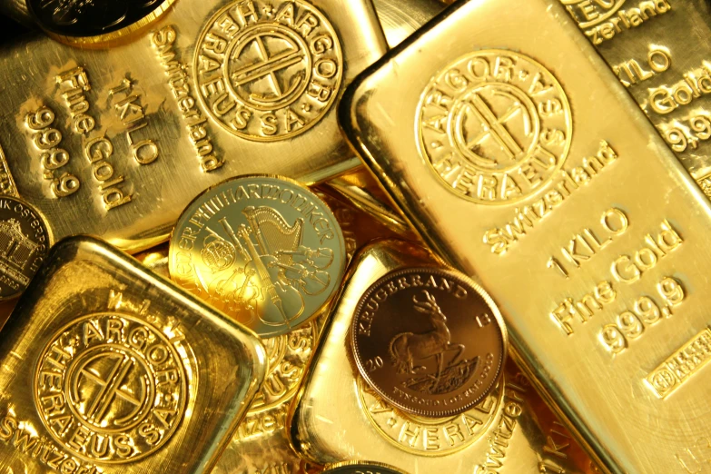 many different gold and silver bars