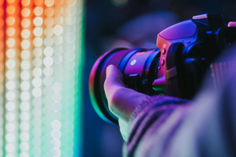 a close up of a camera attached to a string