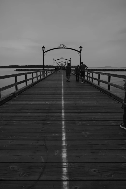 the boardwalk near the water is empty and empty