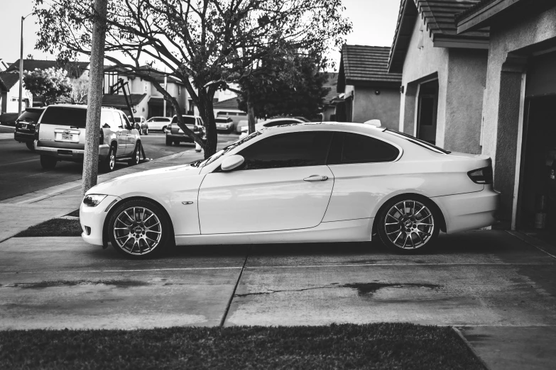 black and white image of a bmw car